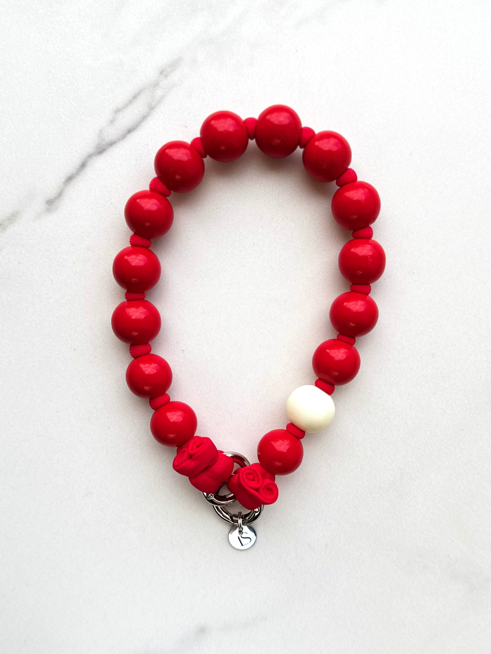 Mini korálkový popruh na telefon – červený